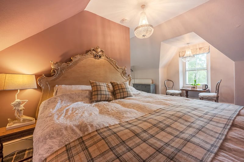 The master bedroom features an en-suite 