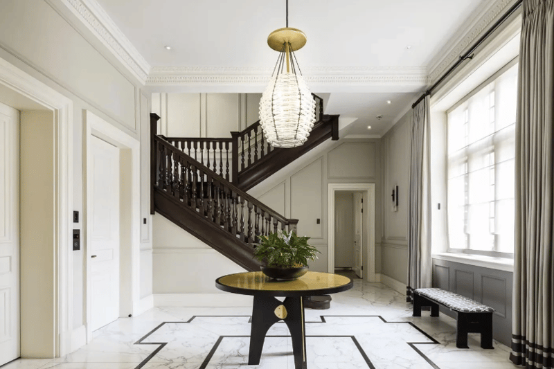 A wide hallway with great, sleek and modern marble floors