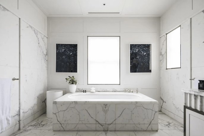 The huge bathtub is definitely the eye catcher here, with so many space to move and unwind, complete with a marble look