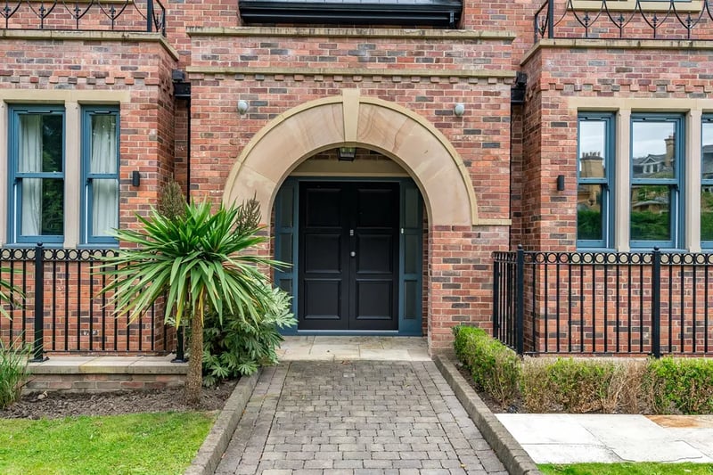 The stunning arched doorway leading to the property