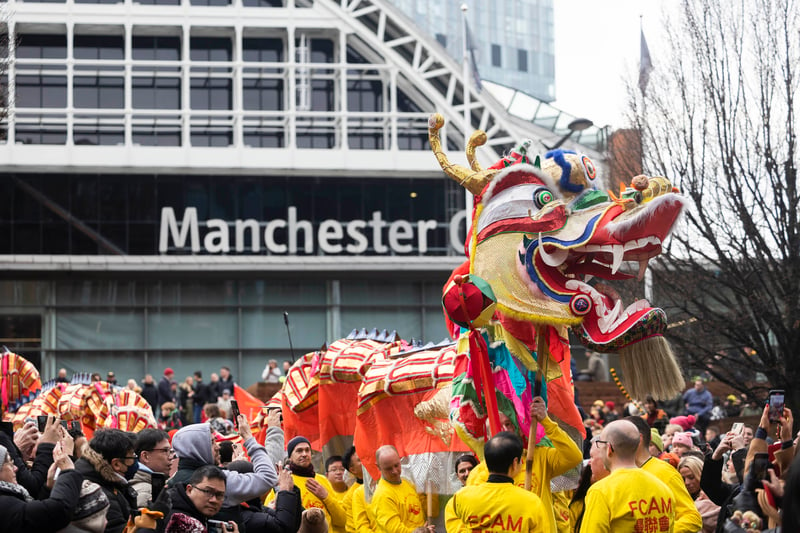 Crowds gathered at Manchester Central to watch the Chinese New Year Dragon Parade.  Credit: Fabio De Paola/PA Wire