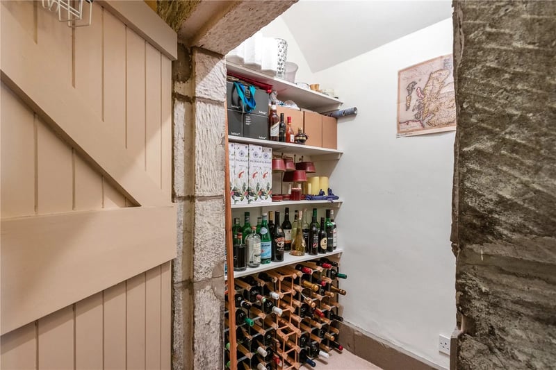 A cloakroom  which can be used as a wine cellar 