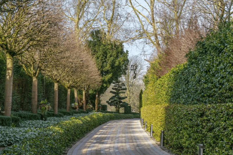 A private, gated path leading up to the property at Merton Lane, London