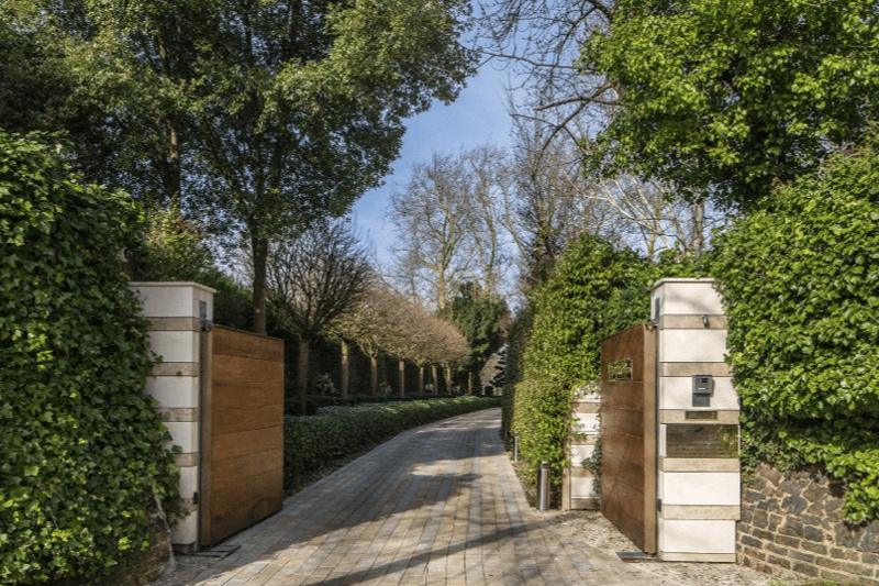 The entrance to the path that leads to the property, showcasing a secure gate granting you privacy