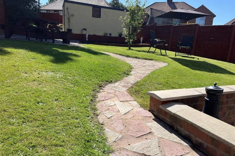 Tiled path in rear garden.