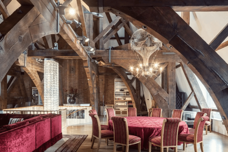 The first image from inside the house, showcasing the dramatic Victorian beams