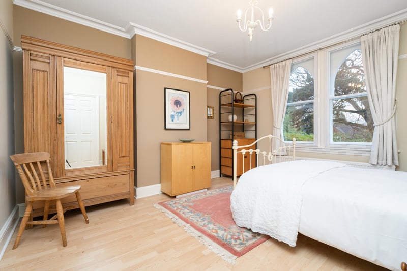 One of the home’s five generous bedrooms. The principal bedroom is one of three bedrooms on this floor boasting a modern en-suite shower room, whilst two further good sized double bedrooms share use of the family bathroom