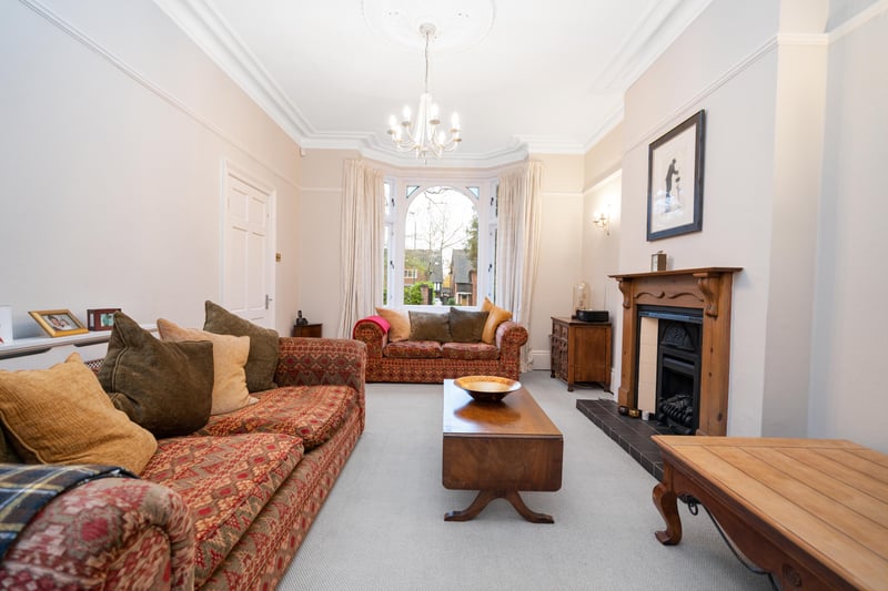 Both front reception rooms boast feature fire places, including a gorgeous log burner in the sitting room, and the dining room leads to a delightful extended dining kitchen with an extensive range of fitted units and an additional dining area