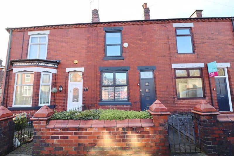 A two bedroom terraced house with a south facing rear garden is for sale.