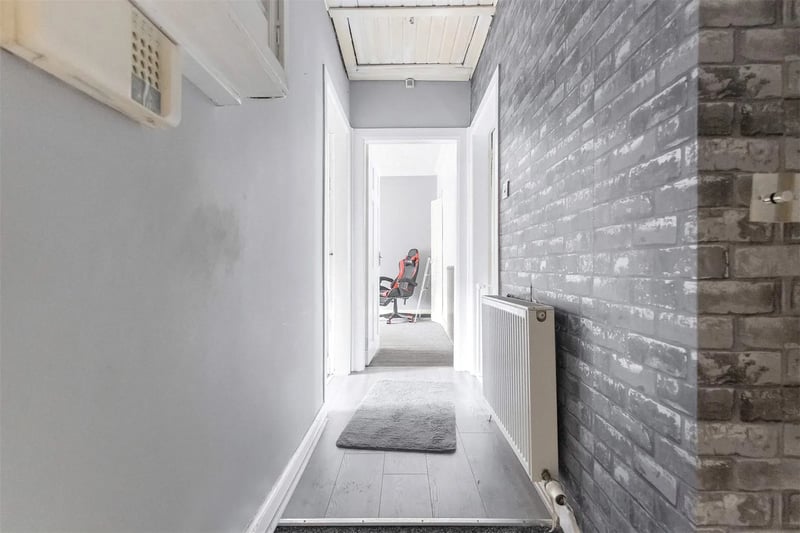 The split-level hallway inside the property 