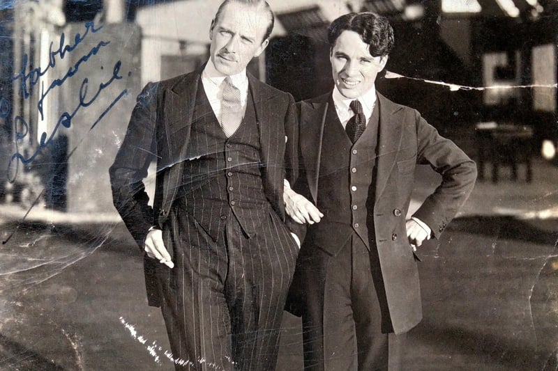 Leslie Stuart with Charlie Chaplin in a photo they both signed.