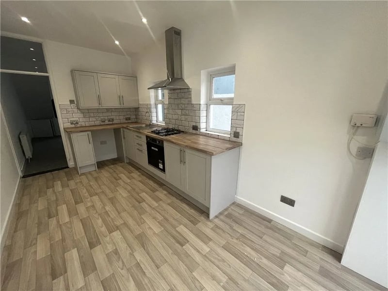 Modern fitted kitchen with a gas hob