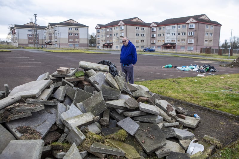 Gowkthrapple currently sits as a ghost scheme in Wishaw, one man is holding out. Nick Wisniewski, 67, the last person living on ‘Britain’s loneliest street’ in Gowkthrapple housing estate in Wishaw, North Lanarkshire, after he refused to move has spent nearly Â£2,000 decorating his home â but said the area has become an eyesore.  See SWNS story SWNJstreet. The last person living on ‘Britain’s loneliest street’ after he refused to move has spent nearly Â£2,000 decorating his home â but said the area has become an eyesore. Nick Wisniewski, 67, has no neighbours living beside him in 128 flats after the last of around 200 residents moved out more than a year ago. The eight blocks of flats and other homes on Stanhope Place in Wishaw, North Lanarkshire, are all scheduled for demolition. But Nick has refused to leave and blasted council chiefs who he claims he has not heard from since November 2021.  