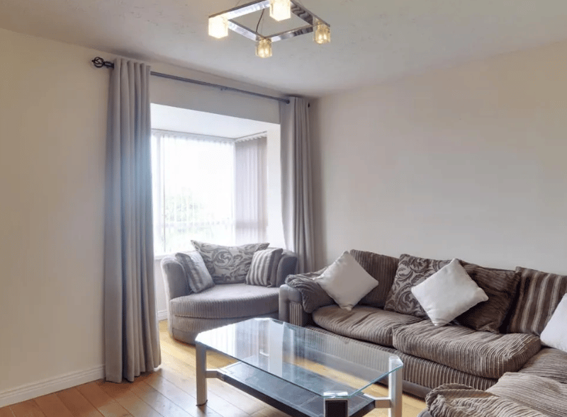 The interior of the property, showcasing a comfortable and roomy sitting area