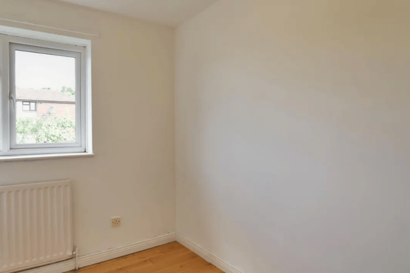 This appears to be an entirely empty room, which can either be made a guest room or whatever you desire