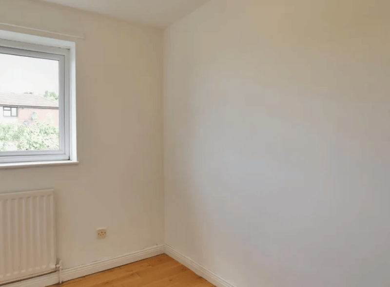 This appears to be an entirely empty room, which can either be made a guest room or whatever you desire