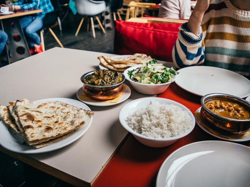The New Bell is a friendly neighbourhood pub in the suburb of Great Barr. They offer delicious curries, mixed grills, wraps and much more - from both Northern and Southern India. (Photo - Unsplash/ Pille R Priske)