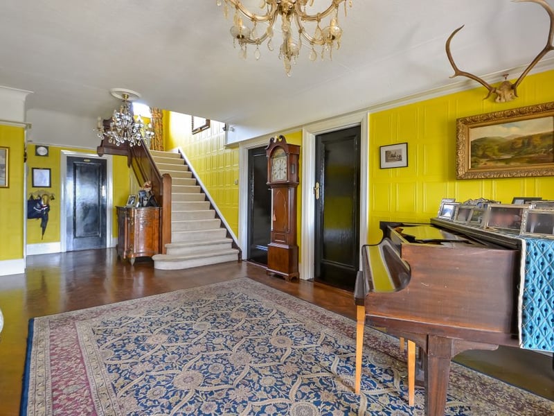 Spacious hallway with an Art Deco theme