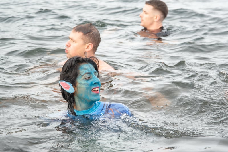 One dipper took the plunge dressed as a Na’vi from the blockbuster Avatar films. Photo: Abdimalig Ibrahim