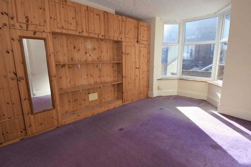 One of two bedrooms available at the property, with huge storage space and big windows to allow for natural light and good air flow