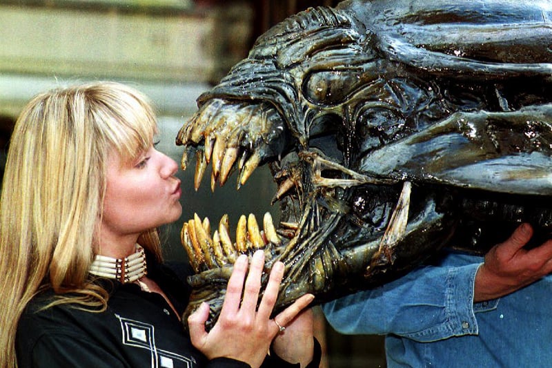 Sculptor Emma Pryke on June 2, 1993, with the xeonomorph she worked on for the film Aliens.  (Picture: Johnny Eggitt/AFP via Getty Images)