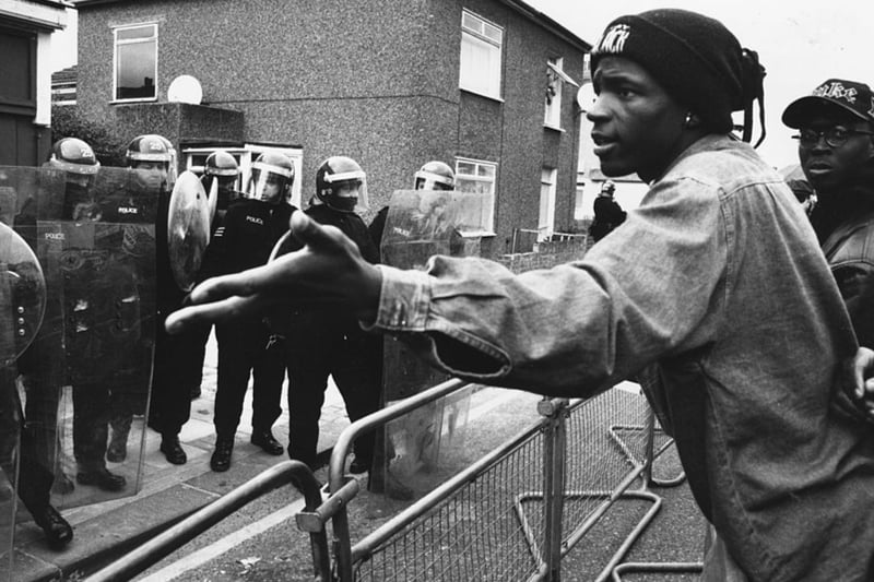 A man appealing to riot police guarding the British National Party (BNP) headquarters in Welling during a demonstration on May 8 over the racist murder of Stephen Lawrence. It was closed down by Bexley exley Council in 1994. (Picture: Steve Eason/Hulton Archive/Getty Images)