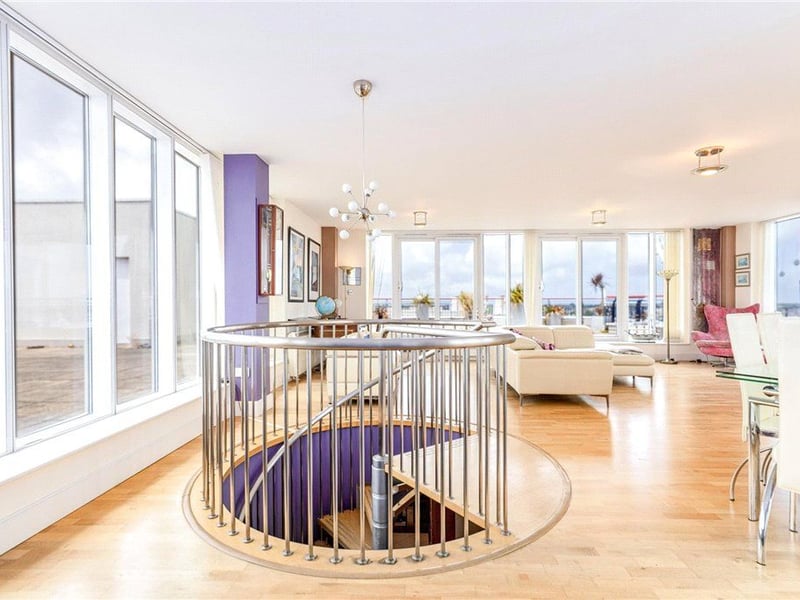 Another angle of the living area and spiral staircase