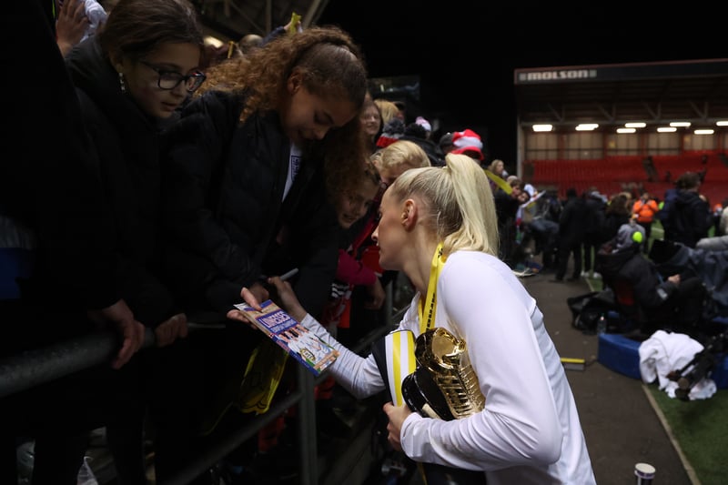 Chloe Kelly, scorer of England’s winning goal at the EUROs, signs autographs