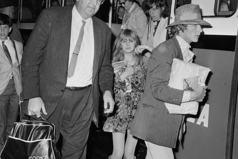 Mick Jagger and Marianne Faithfull arrive at London Airport (now Heathrow), after a flight from Dublin, 14th August 1967. (Photo by George Stroud/Daily Express/Hulton Archive/Getty Images)