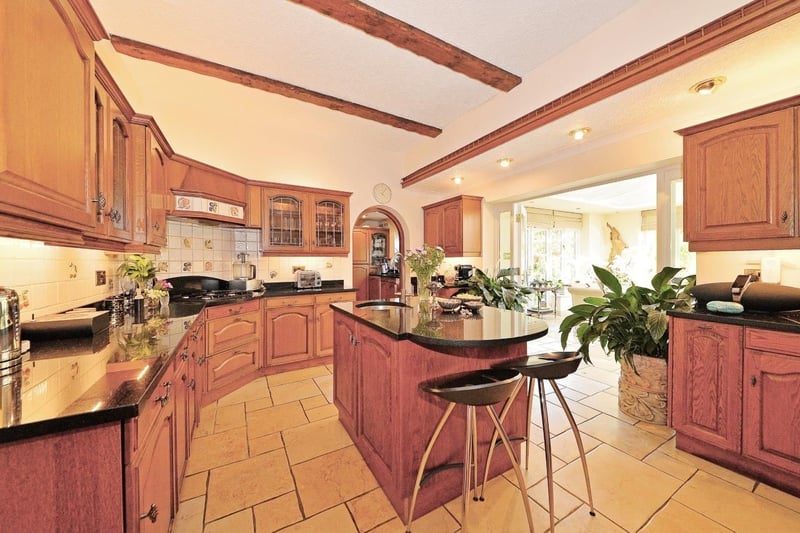 The kitchen with its handy kitchen island  (Photo: Zoopla) 