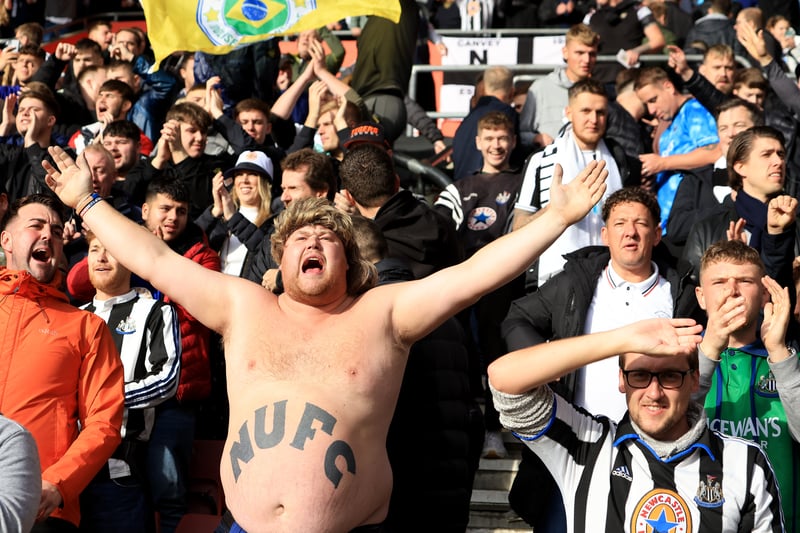 A Newcastle United supporter cheers on his team during the Premier League match between Southampton FC and Newcastle United at Friends Provident St. Mary’s Stadium on November 06, 2022.