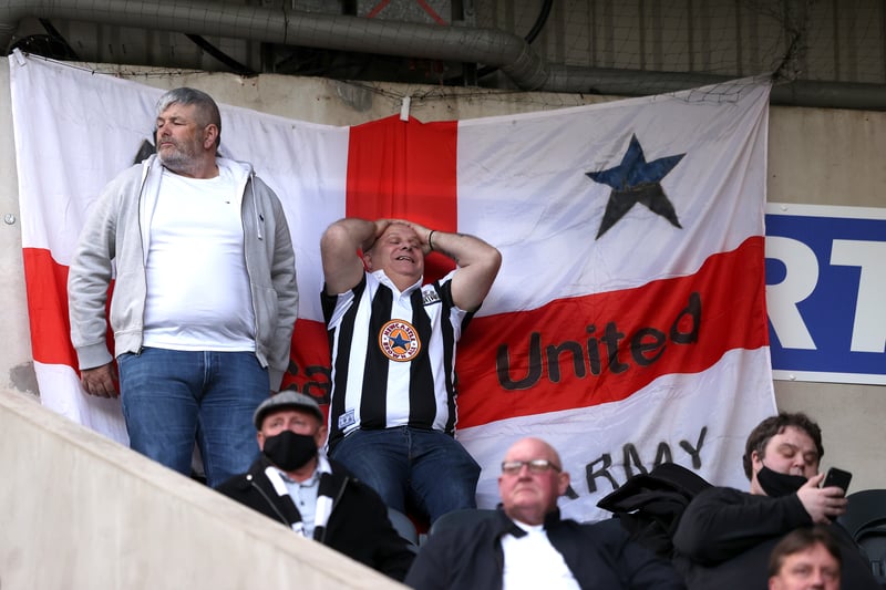 A Newcastle fan shows his frustration during the Premier League match between Newcastle United and Sheffield United at St. James Park on May 19, 2021.