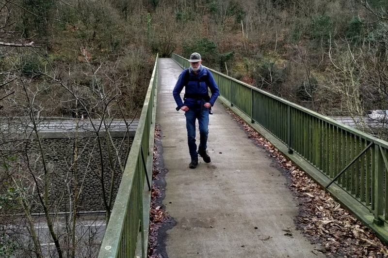 A narrow footbridge takes walkers across the busy M5 motorway between the Clevedon and Portbury junctions