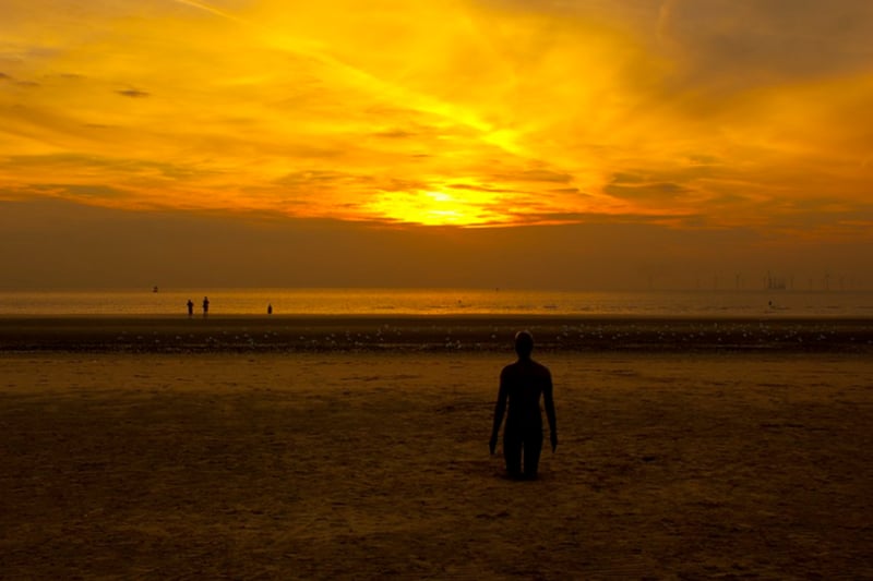 Take a stroll along Crosby beach and admire the beautiful sunset and 'Another Place' by Antony Gormley - known locally as the 'Iron Men'.