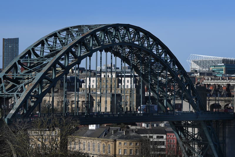 The Tyne Bridge photgraphed in the present day, with St James’ Park in the background. 