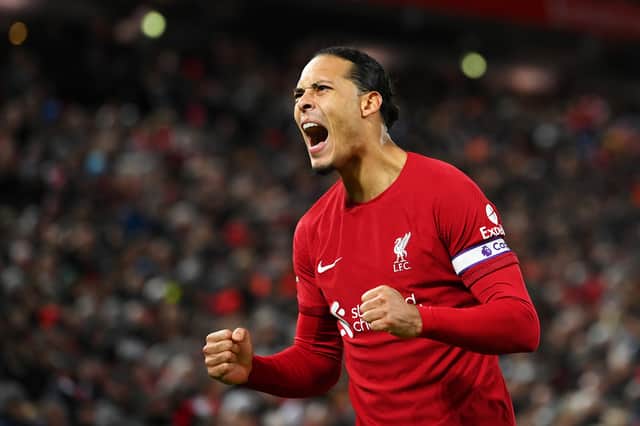 irgil van Dijk of Liverpool celebrates after scoring the team's first goal during the Premier League match between Liverpool FC and Wolverhampton Wanderers at Anfield on March 01, 2023 in Liverpool, England. (Photo by Stu Forster/Getty Images)