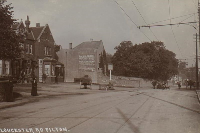 Electrical trams were introduced in Bristol at the turn of the century. This photograph was taken around the early 1900s and shows power cables for the trams along the road.