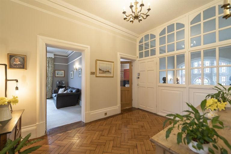 A well presented hallway in the property