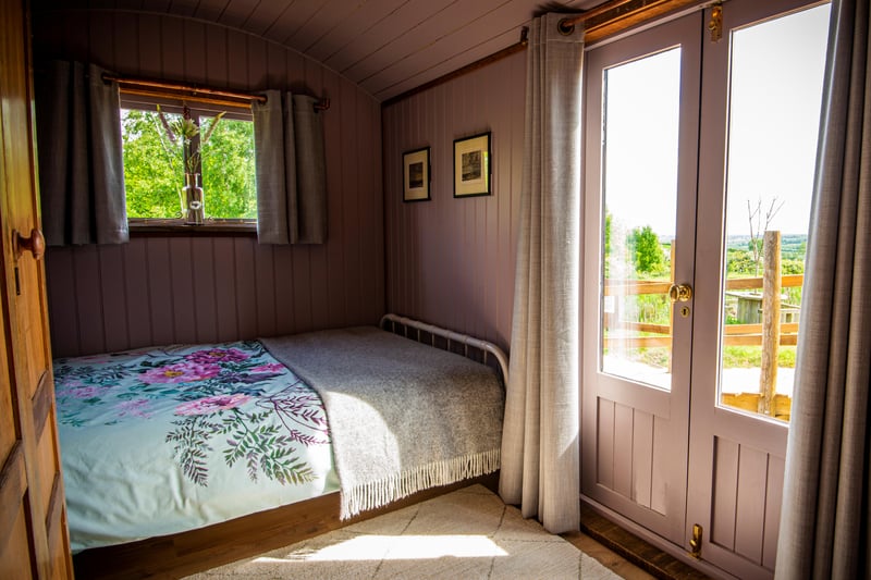 Each bedroom shepherds hut has French doors that open out on the private gravelled area.