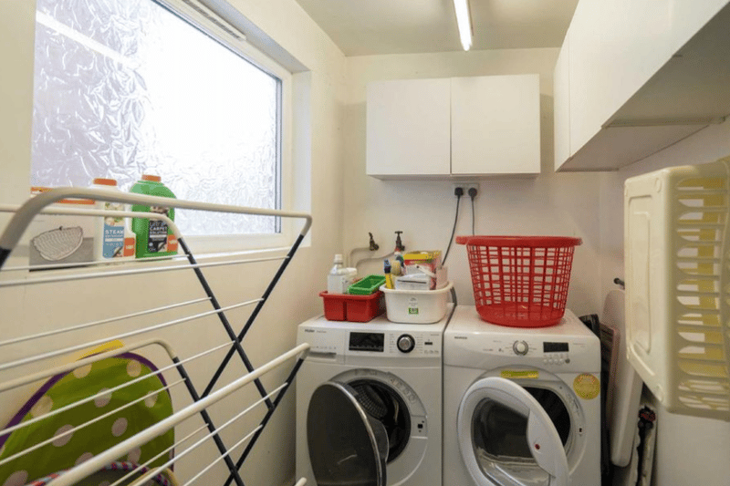 A utility room shown here, freeing up space elsewhere
