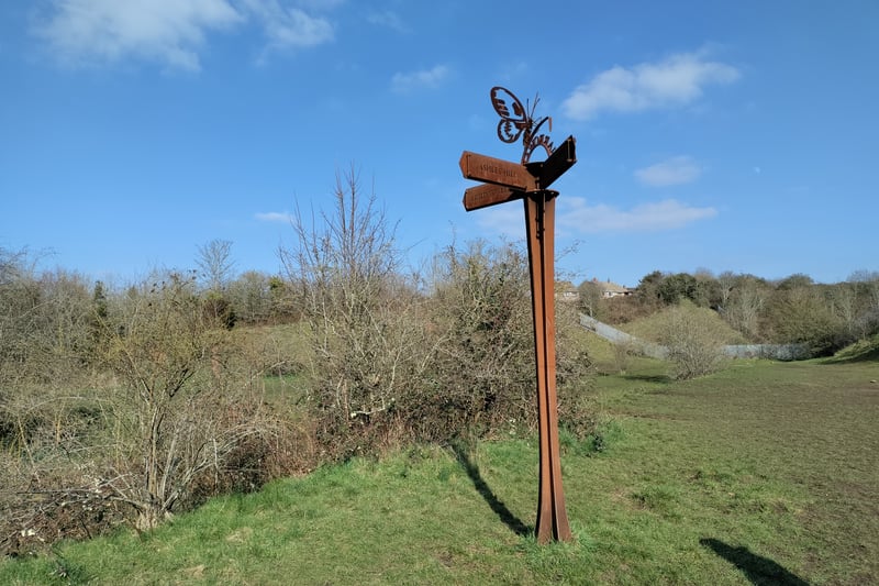 A walk from Boiling Wells Lane up to the top of Narroways Nature Reserve reveals a disused railway bed and another beautiful signpost directing walkers.