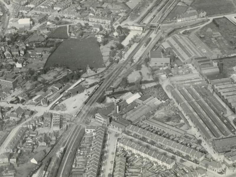 A stop on the line from Bristol to Gloucester or Bath, the station opened in 1866, before closure in 1966. The station, toward the top of this picture next to New Station Road, had two platforms. It was demolished after closure.