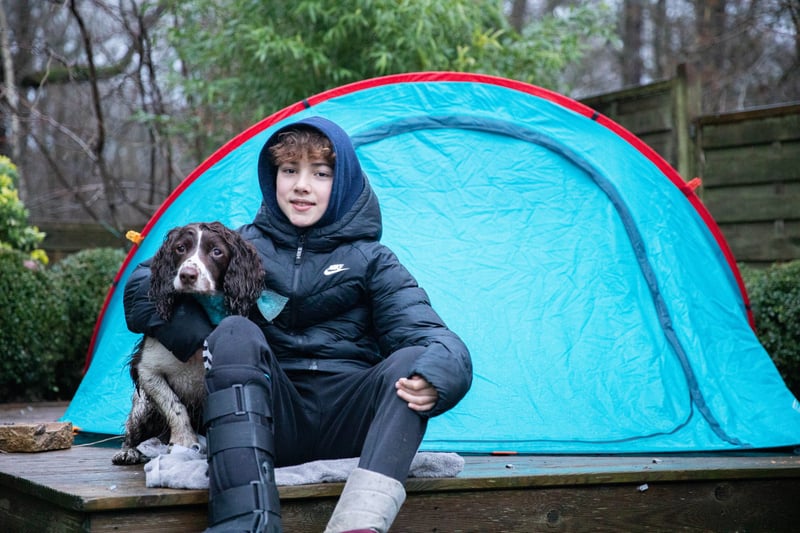 13-year-old Ashley Owens and his dog Bertie, from Welwyn Garden City in Hertfordshire, have spent over 650 nights camping out in a tent as part of their ‘sleep out to help out’ fundraising campaign. The duo are sleeping under the stars to raise £30,000 to help a volunteer-run charity, Paws2Rescue, who are on the Ukraine border, helping find refuge for pets and owners and providing essential supplies to the sheltering Ukrainians. (Photo - The Kennel Club/Eleanor Riley
