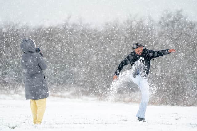 People play in the snow on the Dunstable Downs in Bedfordshire (Photo: PA)