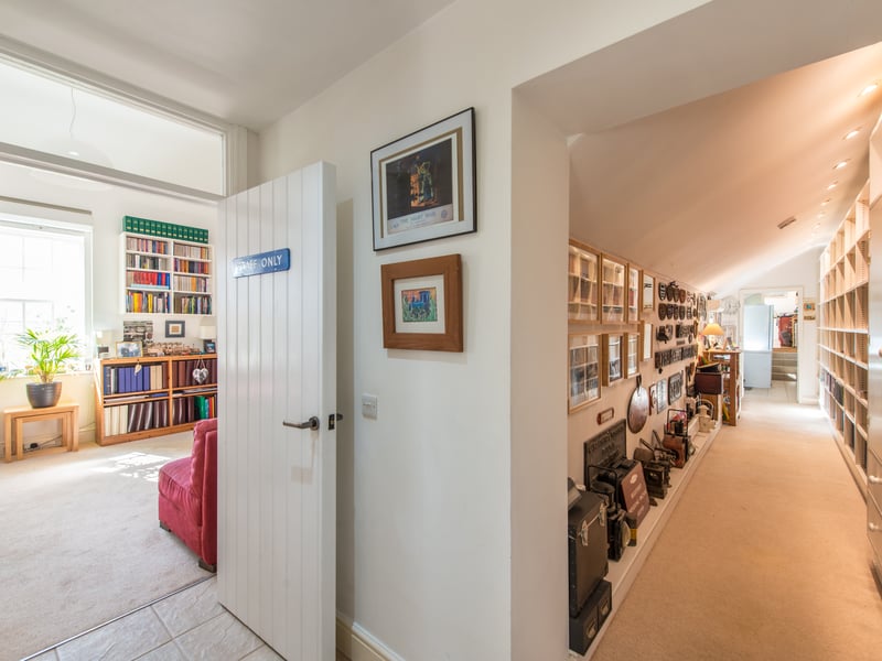 View of the hallway and sitting/dining room. Credit: Exposure Photography