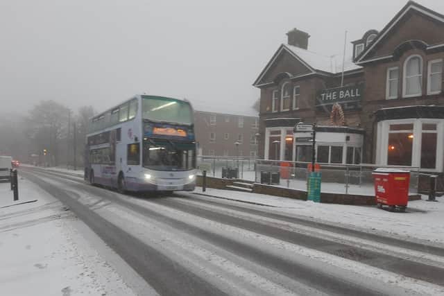 Bus routes and roads have been hit by disruption today as the snow causes chaos across Sheffield’s roads.. File picture shows a bus struggling along a Sheffield road.