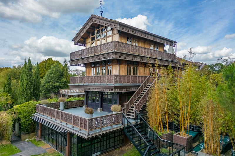  An authentic 19th Century Swiss chalet with a riverfront view shipped over and rebuilt in 1862 is up for sale in west London
