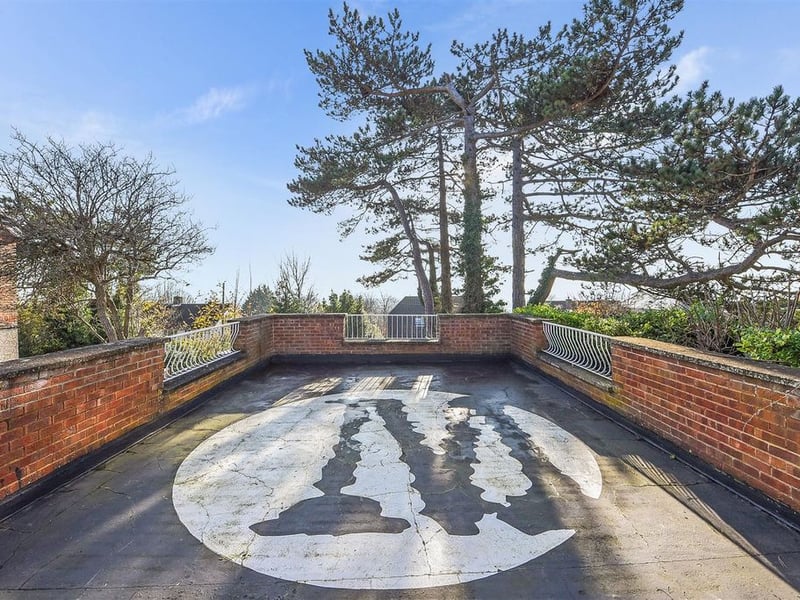 The terrace area is currently branded with the owners music label logo