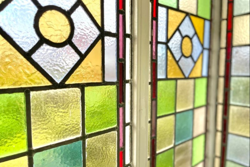 A stunning stained glass window in the entrance to the property.