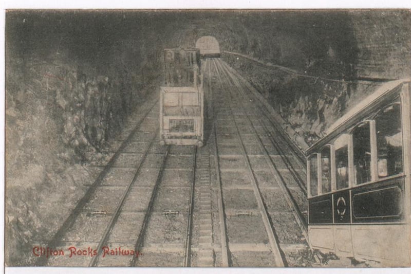The railway system had four cars - each one could accommodate 18 seated passengers who entered through sliding doors. The cars went up and down in pairs on adjacent tracks which can be seen in this picture. 